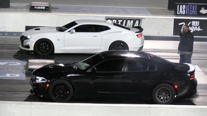 New Camaro SS vs Dodge Charger Scat Pack - drag racing